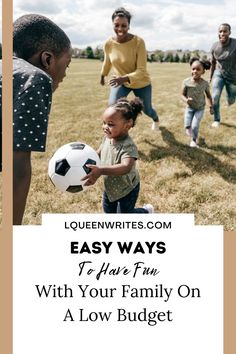 kids playing with a soccer ball on the grass in front of an adult and child