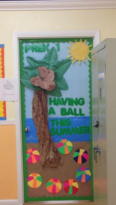 a door decorated with an image of a palm tree and the words, having a ball this summer