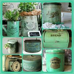 some green tins with plants in them and other things on the table around them