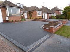 a large driveway in front of some houses