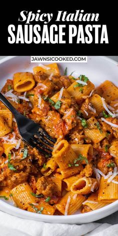 a white bowl filled with pasta sauce and parmesan cheese on top, next to a fork