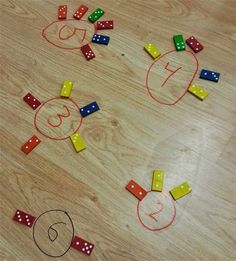 some dices and numbers on a wooden table