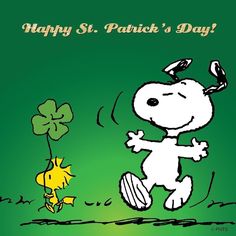 a happy st patrick's day card with a cartoon dog chasing a four leaf clover