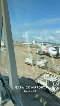 an airport with several planes parked on the tarmac