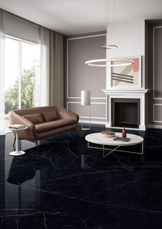 a modern living room with black marble floors