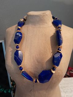 This vintage lapis lazuli nugget necklace is a stunning piece of jewelry that will add a touch of elegance to any outfit. The necklace is made of high-quality materials that have been carefully crafted to ensure that the necklace is both durable and beautiful. The necklace falls under the category of jewelry and watches, specifically vintage and antique jewelry. It is a necklace that is designed to add a touch of sophistication to any look. The necklace is perfect for those who appreciate the beauty of vintage jewelry and want to add a unique piece to their collection. Antique Jewelry Necklace, Nugget Necklace, A Necklace, Vintage Watches, Lapis Lazuli, Jewellery And Watches, Antique Jewelry, The Necklace, Vintage Antiques