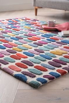 Our Sketch Rug will add a pop of colour and pattern to any room. Combining a fun design with comfort underfoot due to it's Wool tufted and hand carved construction. Naturally durable and easy to care for. Wool and long pile rugs shed fibres when new and during use. This is a characteristic of this product type and we recommend a regular light vacuum to remove any loose fibres from the surface. Perfect for high traffic areas. Rugs can cause slips and trips. It is recommended you use a suitable r… Easy Tufting Ideas, Calm Nursery, Wool Design, Tufted Rugs, Geometric Painting, Rug Modern, Handmade Area Rugs, Pile Rug, Living Room Rug