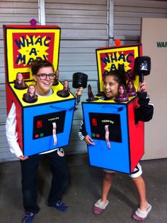 two people wearing costumes made to look like they are playing video games