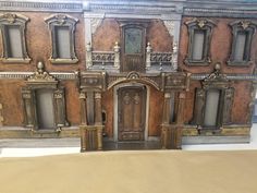 a model of a building with doors and windows