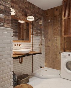 a washer and dryer in a bathroom with wood paneling on the walls