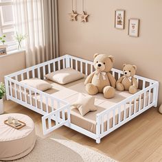 a teddy bear sitting on top of a white crib in a child's room