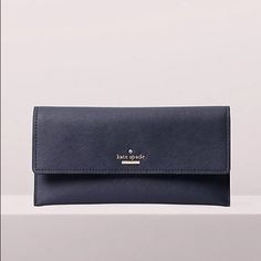 Nwt Brand: Kate Spade Style: Cameron Street Harling Envelope Wallet Color: Blazer Blue Material Crosshated Leather With Matching Trim Bookstripe Printed On Poly Twill Lining Elegant Blue Wallets, Elegant Blue Bifold Wallet, Elegant Blue Evening Wallets, Elegant Evening Blue Wallets, Elegant Blue Wallets With Interior Card Slots, Classic Formal Kate Spade Wallet, Classic Kate Spade Wallets For Daily Use, Elegant Kate Spade Travel Wallet, Kate Spade Elegant Formal Clutch