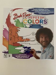 bob ross's speed - colored coloring book is on display