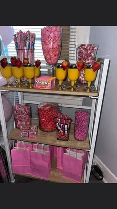 a shelf filled with lots of candy and candies