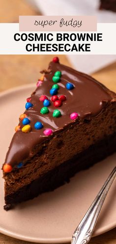 a slice of chocolate cake with sprinkles on it and the words, super fudgey cosmic brownie cheesecake