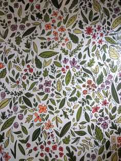 an artistic wallpaper design with flowers and leaves on white paper, painted in bright colors