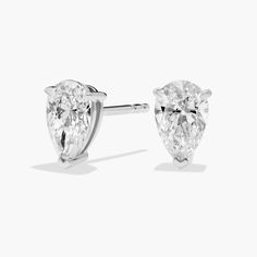 Sparkle with every movement of your head when you wear these classic stud earrings set with pear-cut diamonds. The 14k white gold design promises a cool lustre that beautifully matches the stones. Pear Cut Diamond, Diamond Stud Earrings, Blue Nile, Diamond Stud, Stud Earrings Set, Pear Cut, Gold Design, Diamond Earrings Studs, Diamond Studs