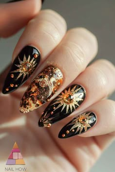 Step into the spotlight with these dramatic long nails featuring a golden sparkle over a deep black base, decorated with rhinestones and sophisticated patterns. These are perfect for any high-glam event or winter gala. Check out more winter nails at nailhow.com! Witchy Fall Nails, Veggie Nails, Opera Nails, Black Celestial Nails, Cathedral Nails, Nails Goddess, Nail Artist Aesthetic, Nature Nails Designs, Gold Nail Inspiration