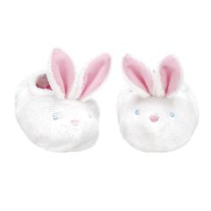 a pair of white slippers with pink ears