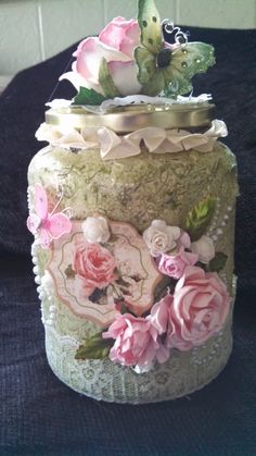 a decorative cake with pink flowers on it