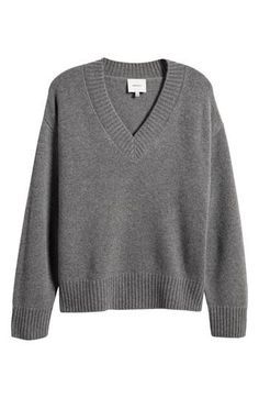 A blend of recycled cashmere and wool adds a luxuriously soft feel to this oversized, layerable V-neck sweater trimmed with cozy ribbing. 24 1/4" length (size XS) V-neck Long sleeves Ribbed cuffs and hem 70% recycled cashmere, 25% cashmere, 5% wool Dry clean Imported Cashmere Sweater V Neck, Grey Vneck Sweater, Recycled Cashmere, Fall 24, Fabric Gift Bags, Oversized Silhouette, Cashmere Wool, Wool Blend Sweater, Fabric Gifts