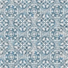 a blue and white wallpaper with an intricate design on it's surface,