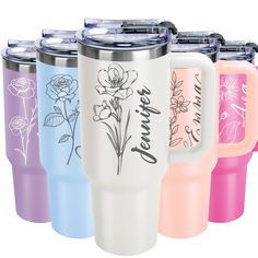 six different colored tumblers with flowers on them