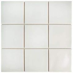 several white tiles are arranged in a square pattern