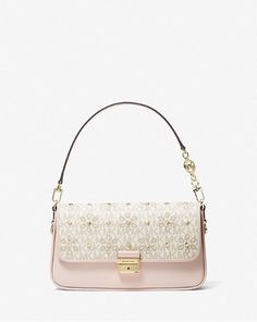 ⚛️100% Authentic Guarantee ⚛️ 👜Michael Kors - Bradshaw Small Embellished Logo and Leather Convertible Shoulder Bag 🍒Color is Vanilla/Soft Pink 🎁Condition is New with Tags 🌷Size: 10.75”W X 5.88”H X 2.75”D 🏆Gold-tone hardware * Push Lock Closure * 7" Handle Drop * 1 Exterior Slip Pocket * Interior details: center slip pocket, center card slot * Dust Bag Included * 1.4 lbs * Leather * Imported 🏆🏆🏆🏆🏆High Quality 👍👍👍👍👍 Beige Bags, Pink Michael Kors Bag, Hand Bags For Women, Dream Bags, Mk Purse, Beige Bag, Girl Fits, Michael Kors Handbags, Beauty Ideas