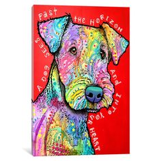 a red pillow with a colorful dog on it's front and the words, pet the