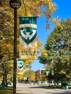 A Warrior Strong sign in front of the yellow fall trees on campus. College Aesthetic, Dream College, Higher Learning, School Tops, College Life