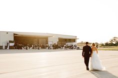 Airplane Hangar Wedding Shows Off Minnesota Style to Out-Of-Town Guests | Minnesota Bride Airport Theme, Airplane Wedding, Aviation Wedding