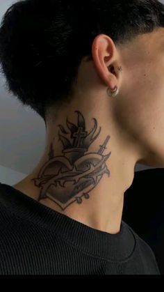 a woman with a tattoo on her neck