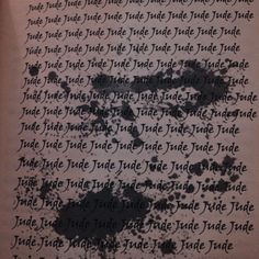 an old book with writing on it and ink splatters all over the page