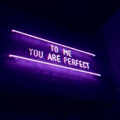 a neon sign that says to me you are perfect