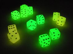 glow in the dark dices are glowing green