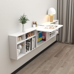 a white shelf with some books on it