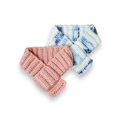 two knitted headbands are shown on a white background, one is pink and the other is blue