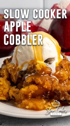 a white plate topped with apple cobbler covered in ice cream and caramel sauce