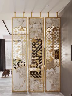 the room divider is decorated in gold and white