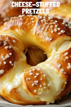 cheese stuffed pretzels on a plate with sesame seeds