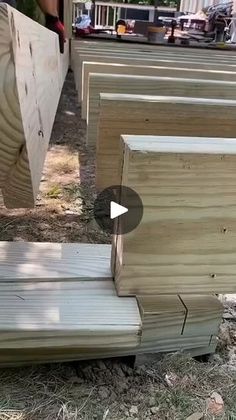 several pieces of wood sitting on the ground