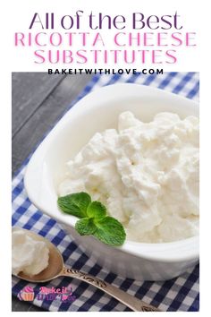 a white bowl filled with cottage cheese and mint on top of a blue checkered table cloth