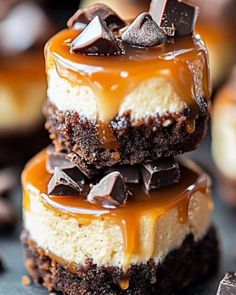 three desserts stacked on top of each other with chocolate and caramel drizzle