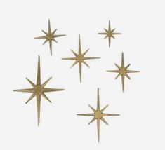 six golden stars are arranged in the shape of a star