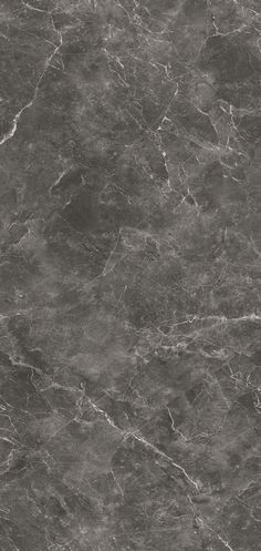 a black and white marble textured wall or floor with dark gray veiners on it