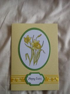 a greeting card with daffodils on it