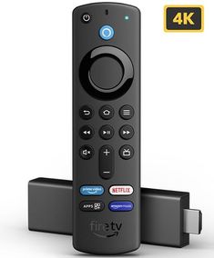 a remote control sitting on top of a black box with the word fire tv above it