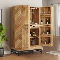 a wooden cabinet filled with lots of bottles and glasses next to a potted plant