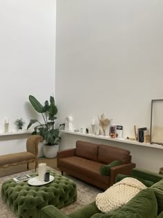 a living room filled with furniture and plants